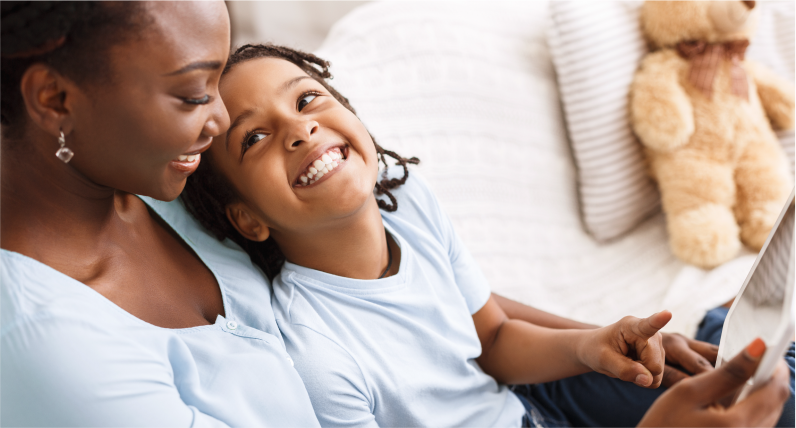 Parent and child reading together, demonstrating family engagement with Story Zoo